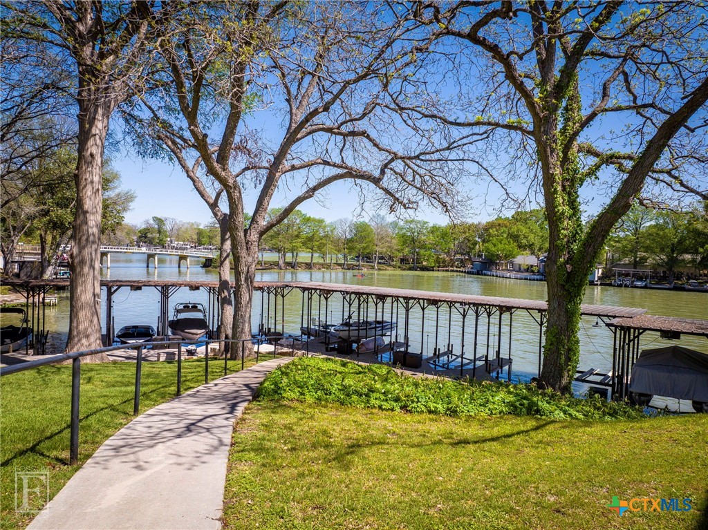 551 Terminal Loop Road, Unit B3 McQueeney, TX 78123 - Photo 7 of 13 a garden view with a seating space