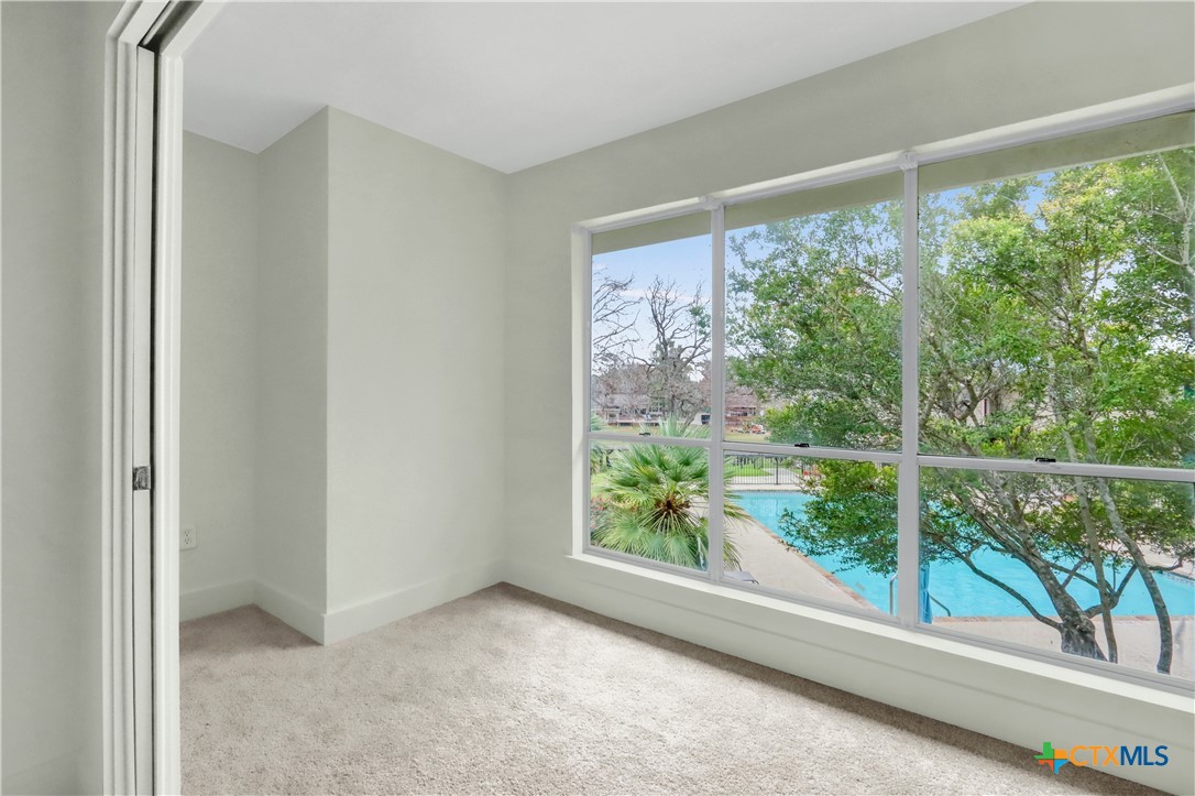 551 Terminal Loop Road, Unit B3 McQueeney, TX 78123 - Photo 8 of 41 a view of a room with a large window