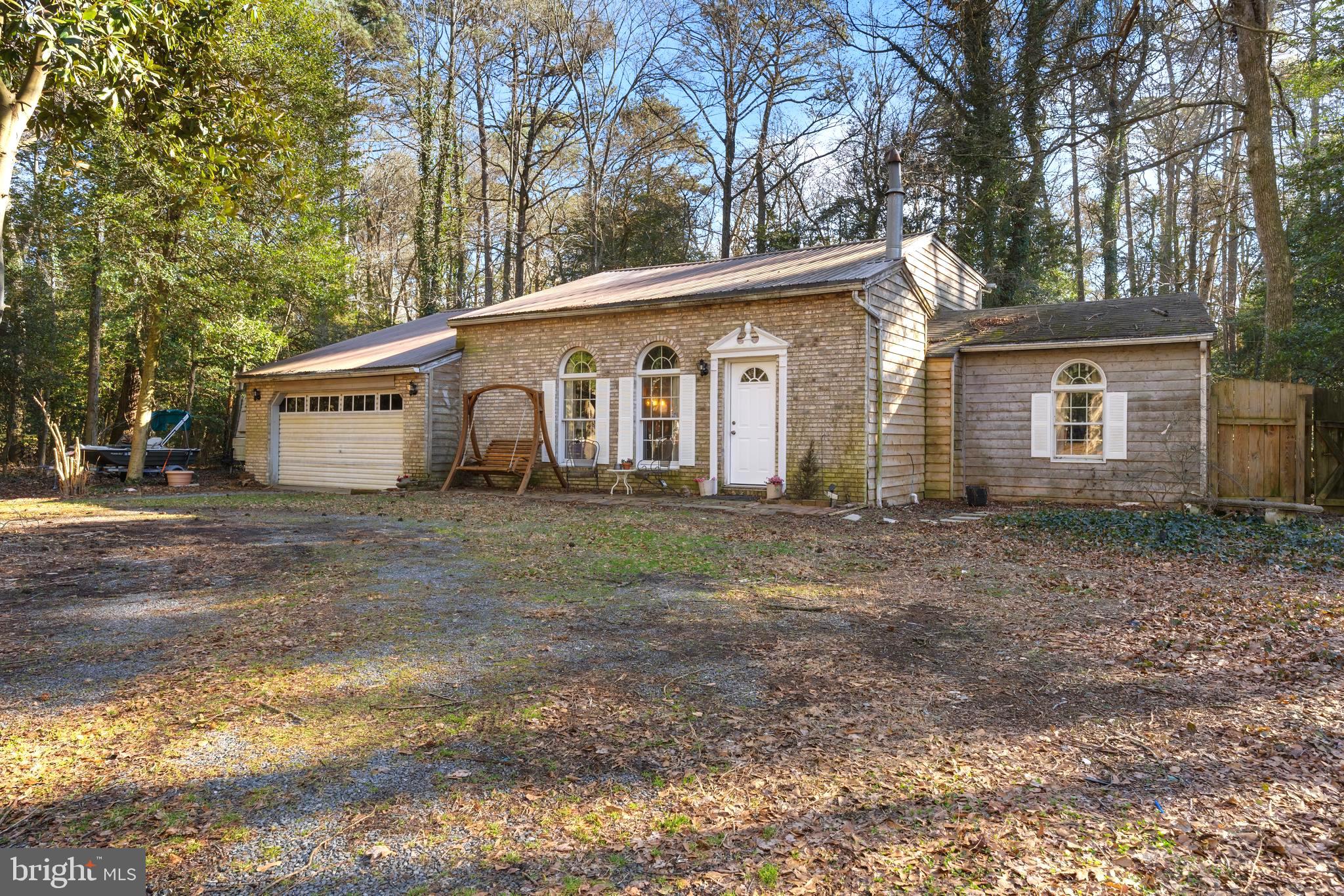 13640 Collins Pond Road East Georgetown, DE 19947 - Photo 1 of 41 a view of a house with a yard