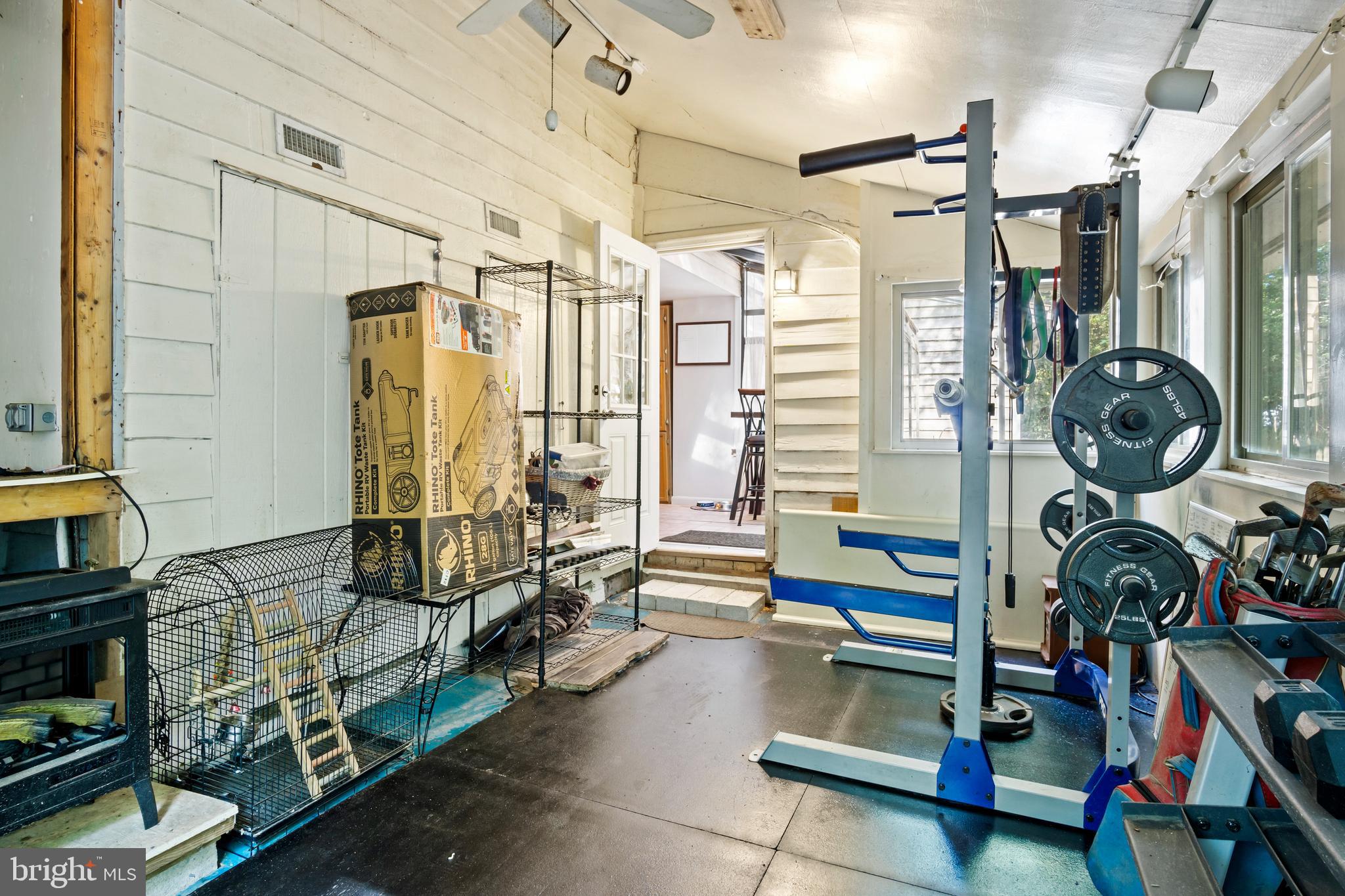13640 Collins Pond Road East Georgetown, DE 19947 - Photo 32 of 41 a view of a room with gym equipment