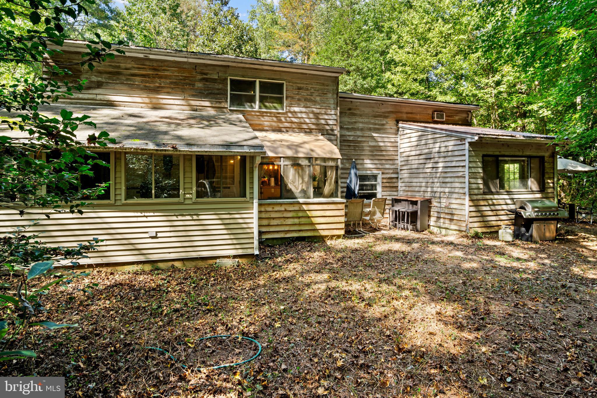 13640 Collins Pond Road East Georgetown, DE 19947 - Photo 37 of 41 a house view with a backyard space