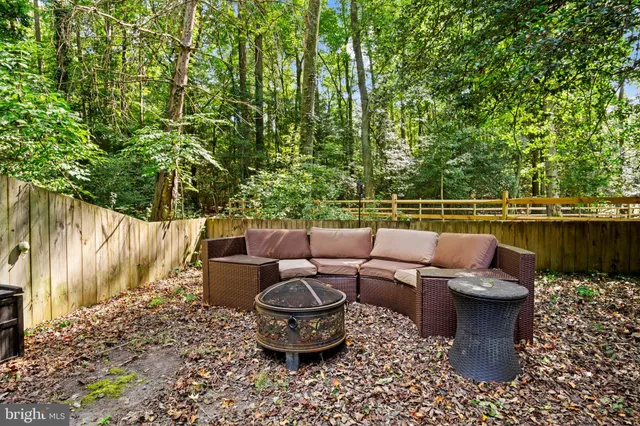a front view of a house with many windows