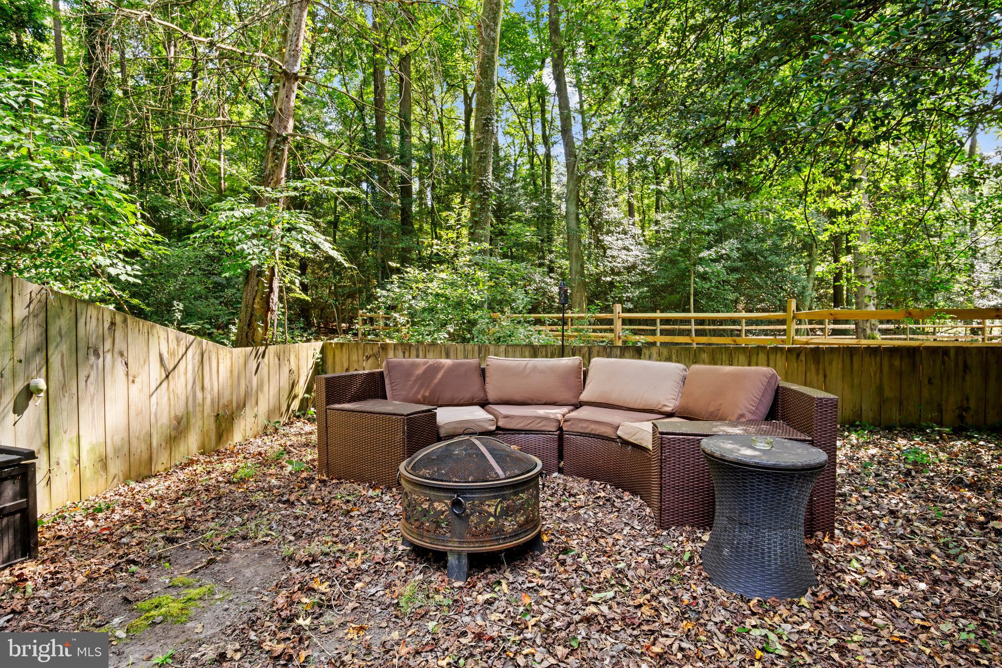 13640 Collins Pond Road East Georgetown, DE 19947 - Photo 40 of 41 a backyard of a house with outdoor seating