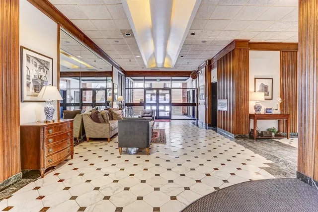 a living room with a couch and a table