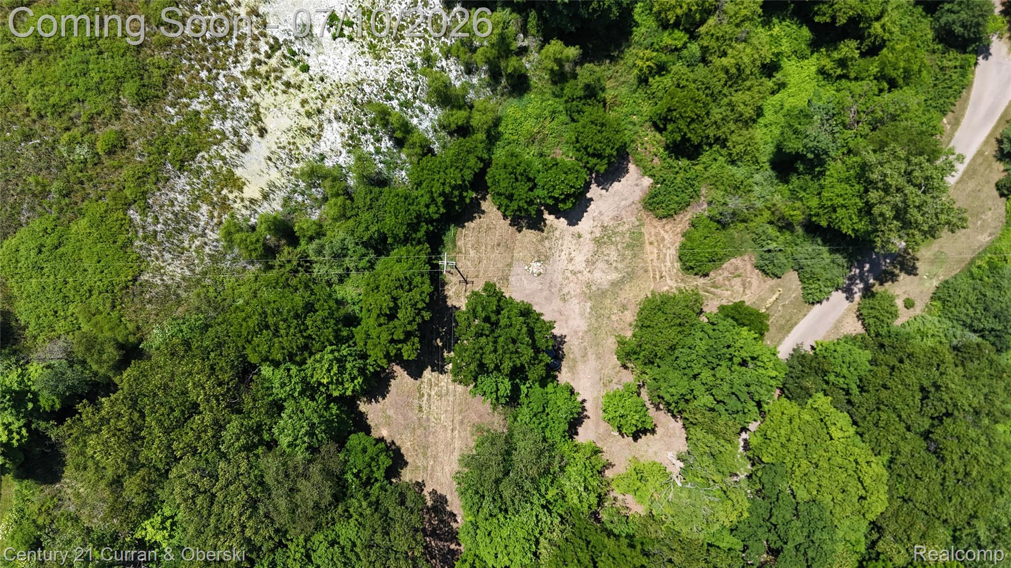 13505 Island Lake Road Chelsea, MI 48118 - Photo 7 of 23 DJI_20260703133042_0166_D.JPG