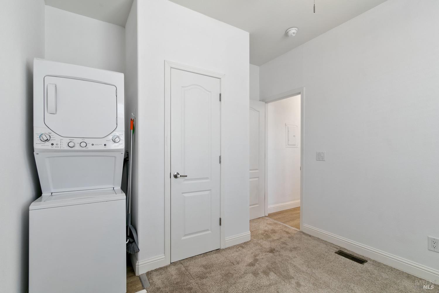 1161 Benicia Road, Unit 18 Vallejo, CA 94591 - Photo 13 of 16 a view of storage and utility room with washer and dryer