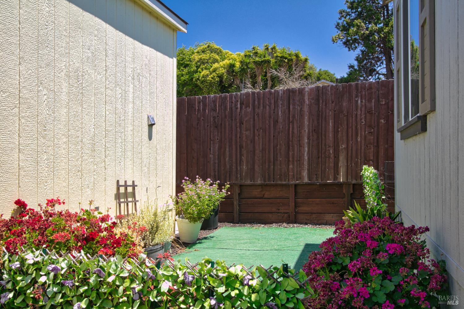 1161 Benicia Road, Unit 18 Vallejo, CA 94591 - Photo 16 of 16 a view of small garden with flowers
