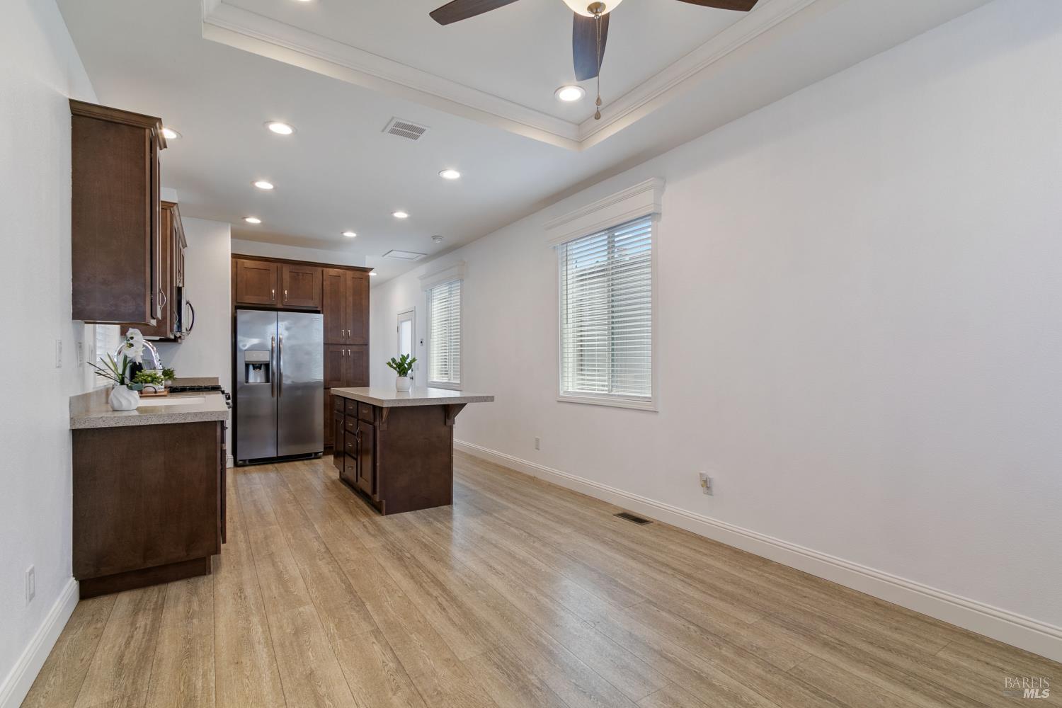 1161 Benicia Road, Unit 18 Vallejo, CA 94591 - Photo 7 of 16 a kitchen with a refrigerator and a sink