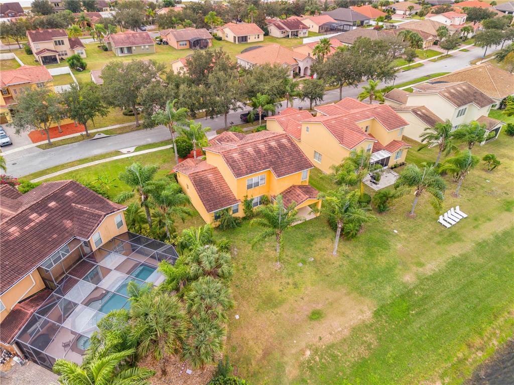 3111 Silver Fin Way Kissimmee, FL 34746 - Photo 6 of 50 an aerial view of residential houses with yard