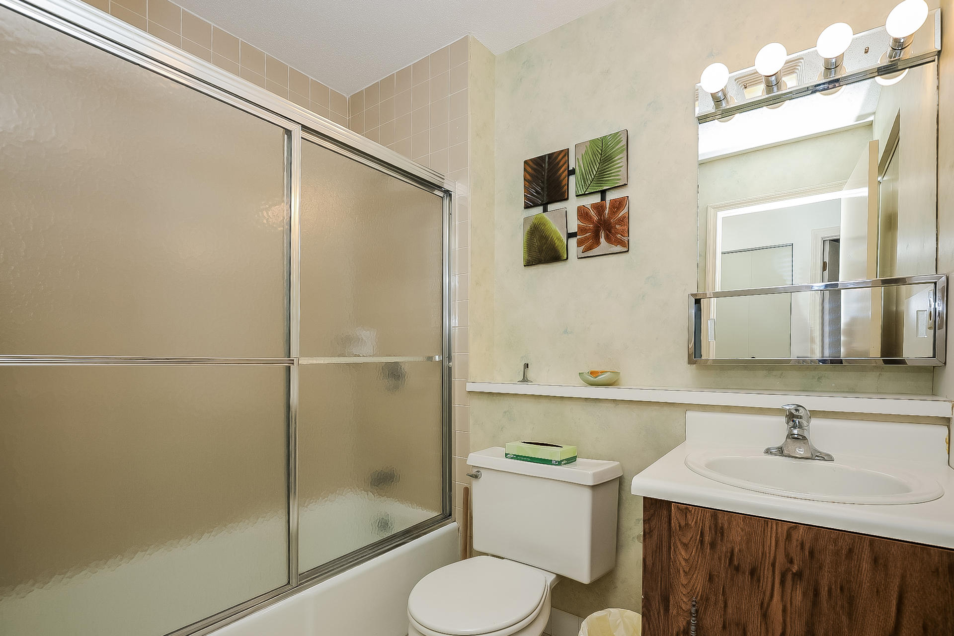 800 Bearses Way, Unit 3EB Hyannis, MA 02601 - Photo 18 of 23 a bathroom with a sink toilet and shower