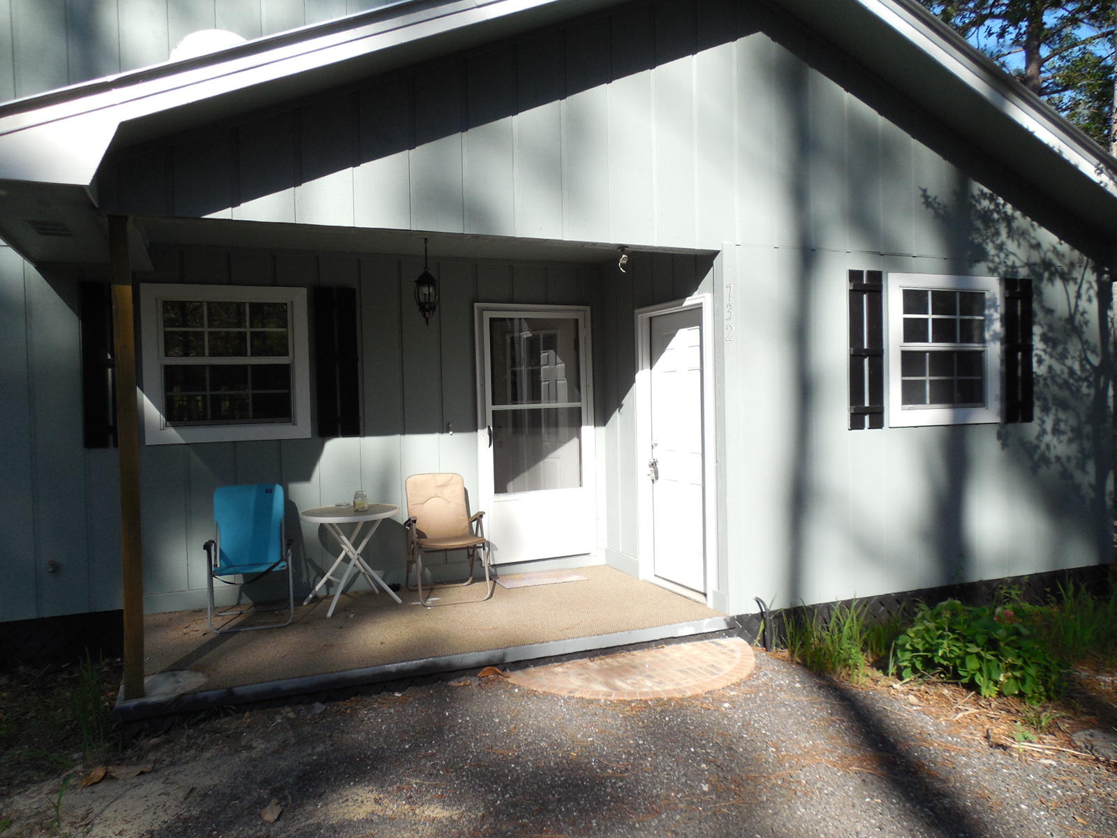 732 Spring Lake Road DeFuniak Springs, FL 32433 - Photo 12 of 44 a view of a porch with furniture