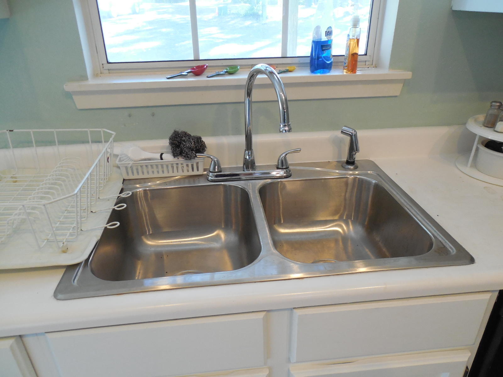 732 Spring Lake Road DeFuniak Springs, FL 32433 - Photo 18 of 44 a close view of sink and tap
