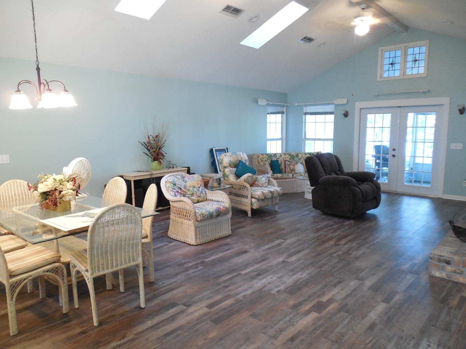 732 Spring Lake Road DeFuniak Springs, FL 32433 - Photo 21 of 44 a living room with furniture and wooden floor