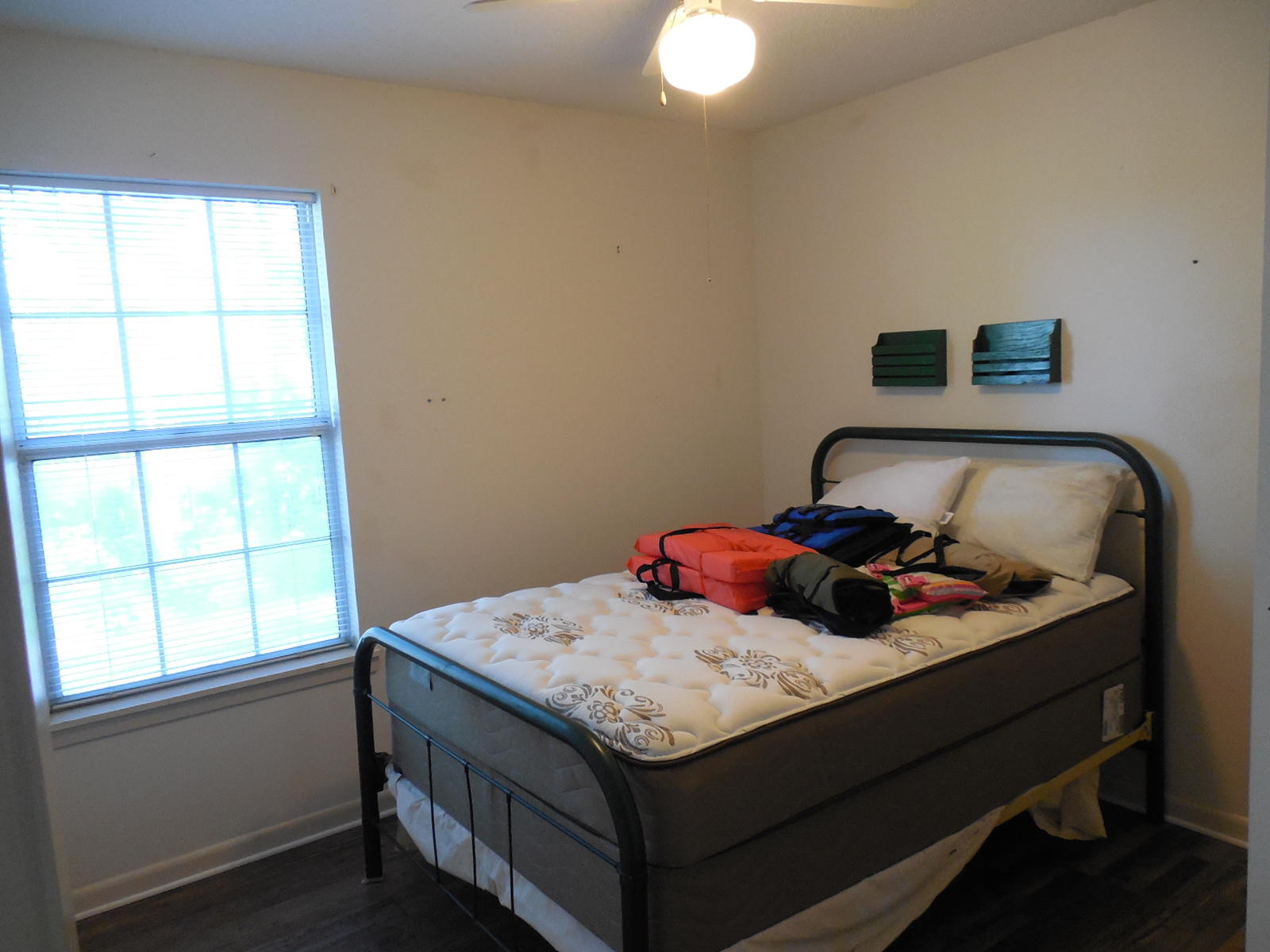 732 Spring Lake Road DeFuniak Springs, FL 32433 - Photo 23 of 44 a bedroom with a bed and window