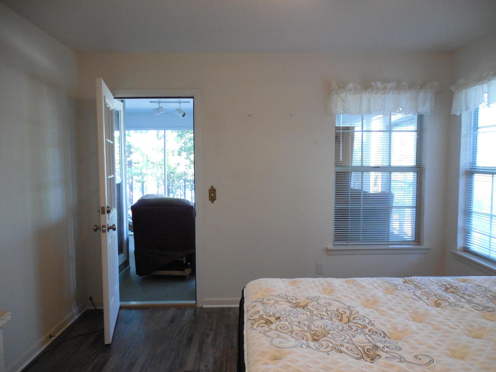 732 Spring Lake Road DeFuniak Springs, FL 32433 - Photo 26 of 44 a bedroom with a bed and a window