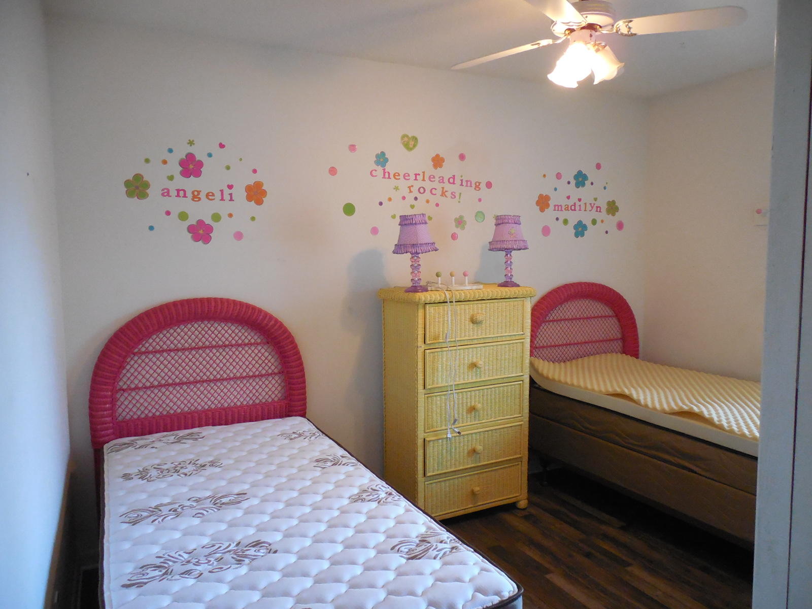 732 Spring Lake Road DeFuniak Springs, FL 32433 - Photo 33 of 44 a bedroom with a bed and a chandelier