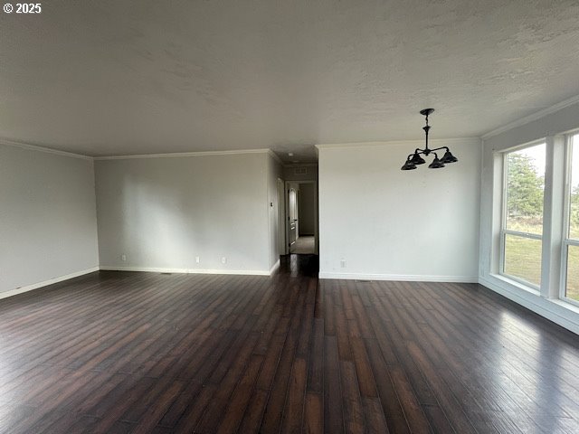 9290 Southwest 3115th Road Culver, OR 97734 - Photo 13 of 21 an empty room with wooden floor and windows