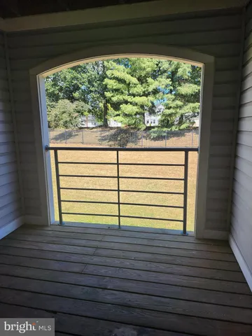 a view of a balcony with a window