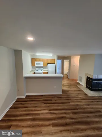 a view of kitchen and kitchen with furniture