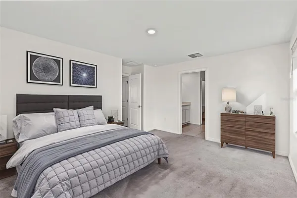 a bedroom with a bed and closet