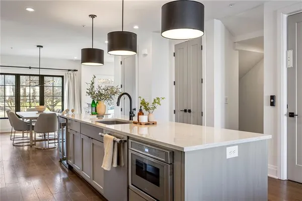a kitchen with a sink and stove