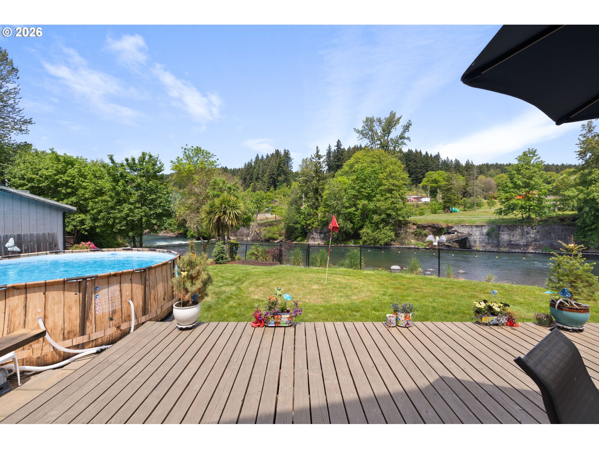 210 Southeast Whitten Road Mill City, OR 97360 - Photo 42 of 48 a view of a wooden deck and a yard