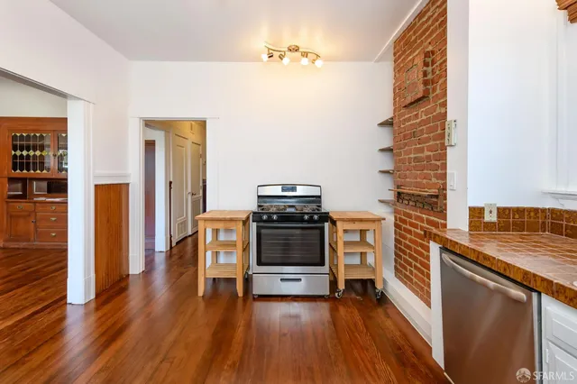 a view of a city from a hallway