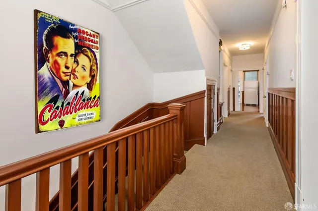a kitchen with stainless steel appliances granite countertop a refrigerator and a stove