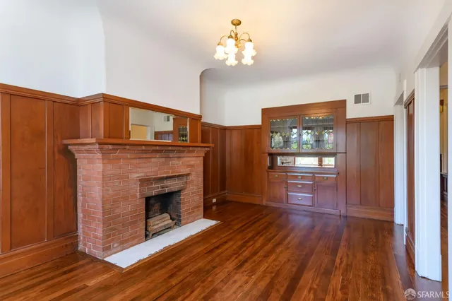 a view of livingroom with furniture wooden floor and window