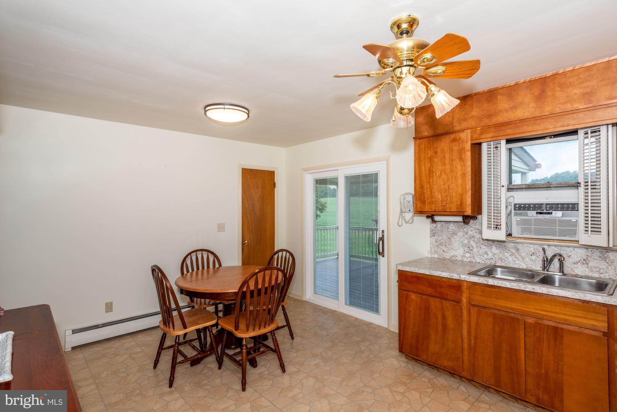 336 School Road Denver, PA 17517 - Photo 14 of 26 a dining room with furniture and window