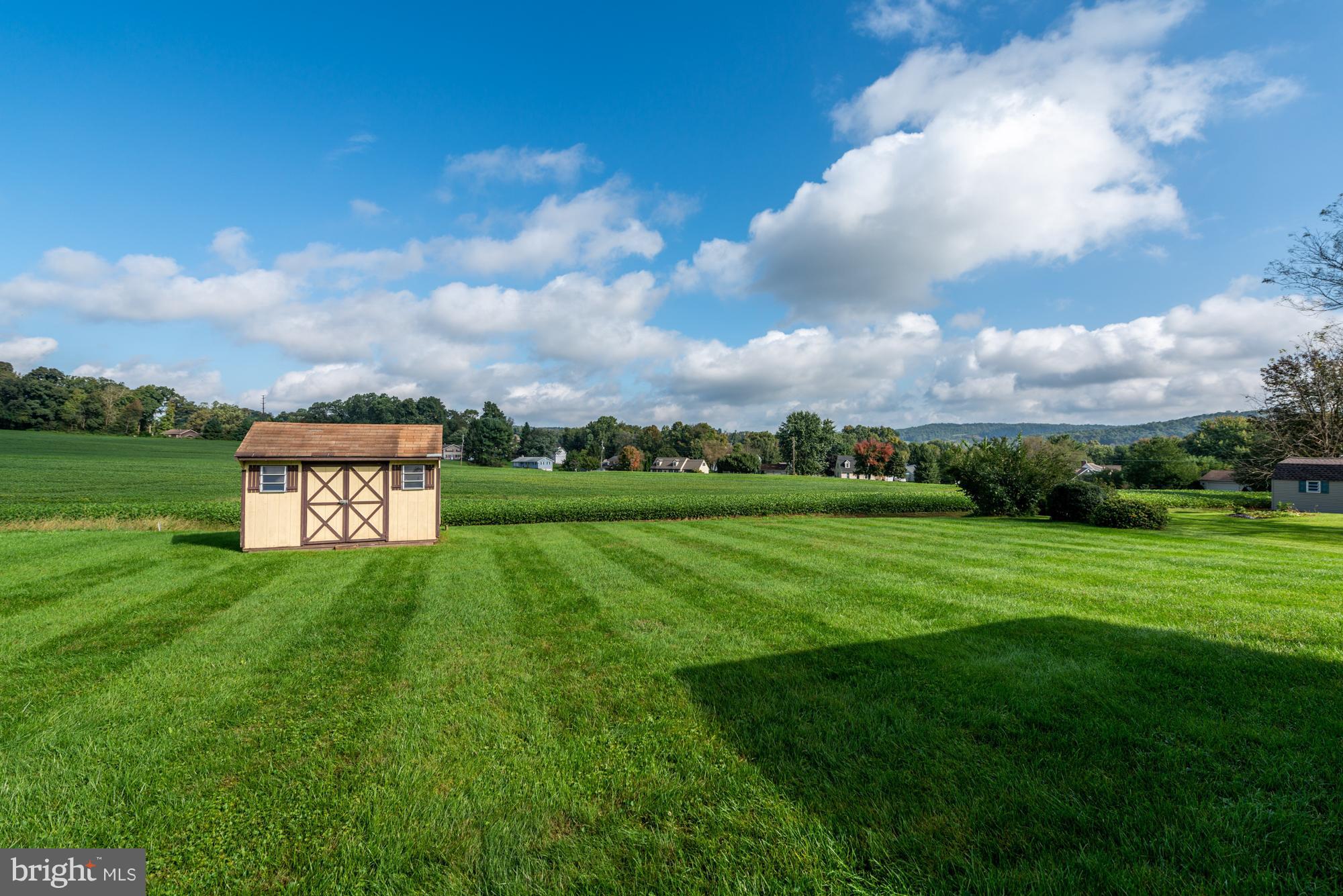 336 School Road Denver, PA 17517 - Photo 26 of 26 a view of a golf course with a garden