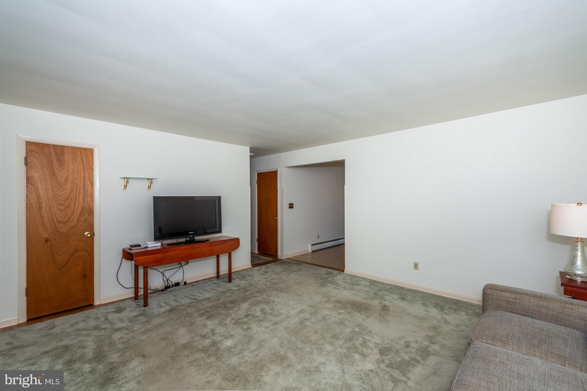 336 School Road Denver, PA 17517 - Photo 7 of 26 a living room with furniture and a flat screen tv