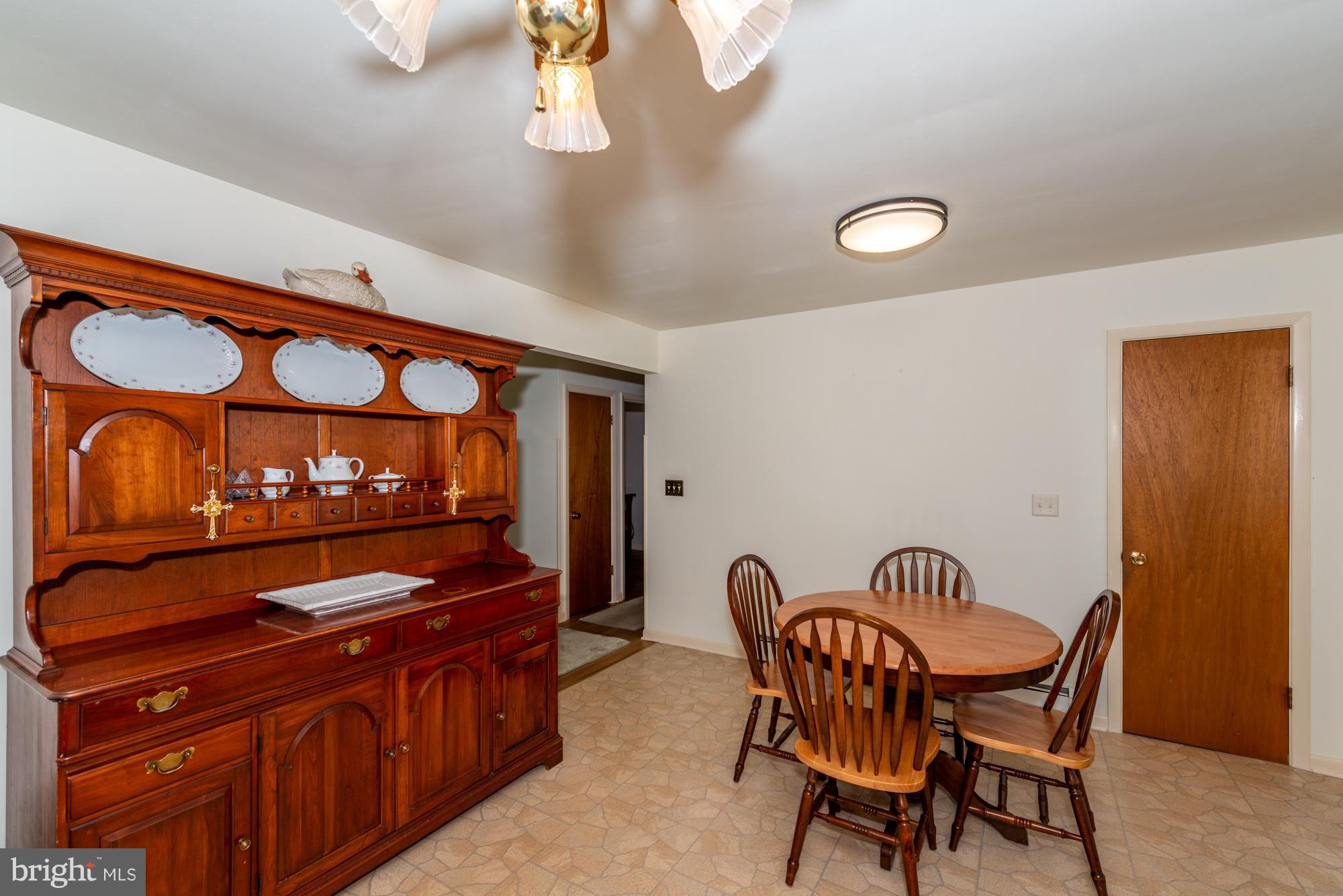 336 School Road Denver, PA 17517 - Photo 9 of 26 a view of a chairs and table in a room