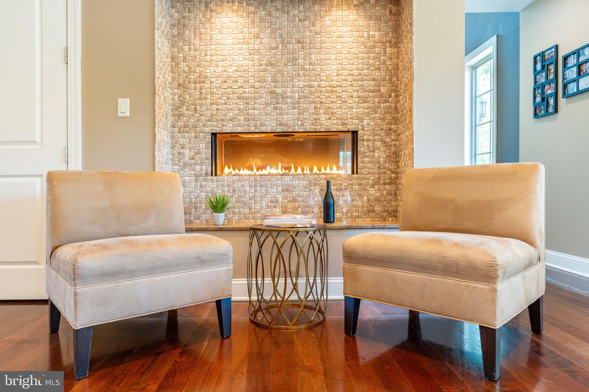 3 Stonebridge Crossing Road Newtown, PA 18940 - Photo 18 of 77 a living room with furniture and a fireplace