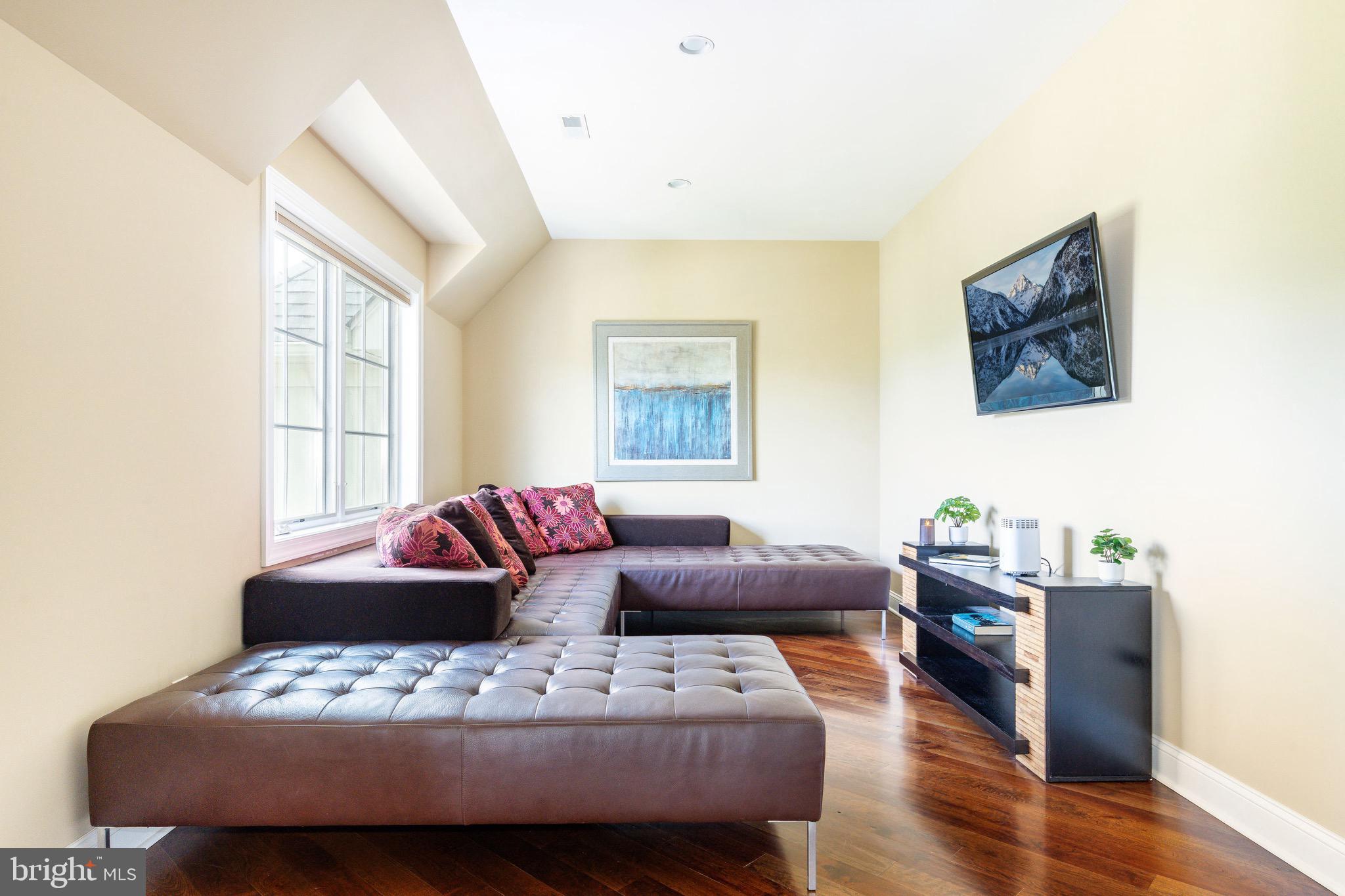 3 Stonebridge Crossing Road Newtown, PA 18940 - Photo 26 of 77 a bedroom with furniture a bed and wooden floor
