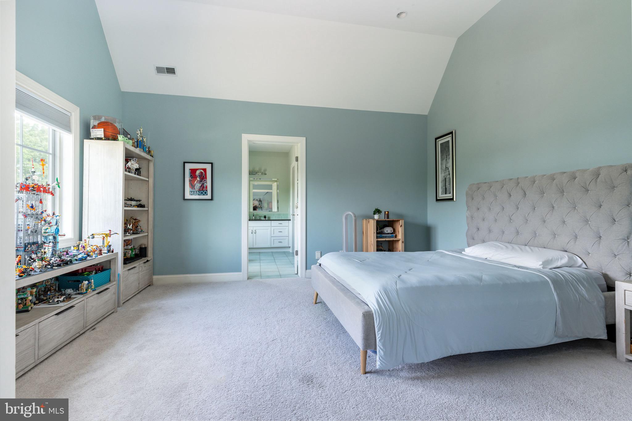 3 Stonebridge Crossing Road Newtown, PA 18940 - Photo 30 of 77 a bedroom with a bed and a flat tv screen on dresser