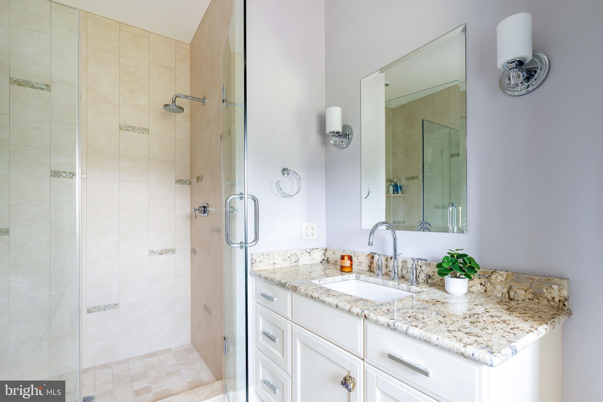 3 Stonebridge Crossing Road Newtown, PA 18940 - Photo 34 of 77 a bathroom with a granite countertop sink and a mirror