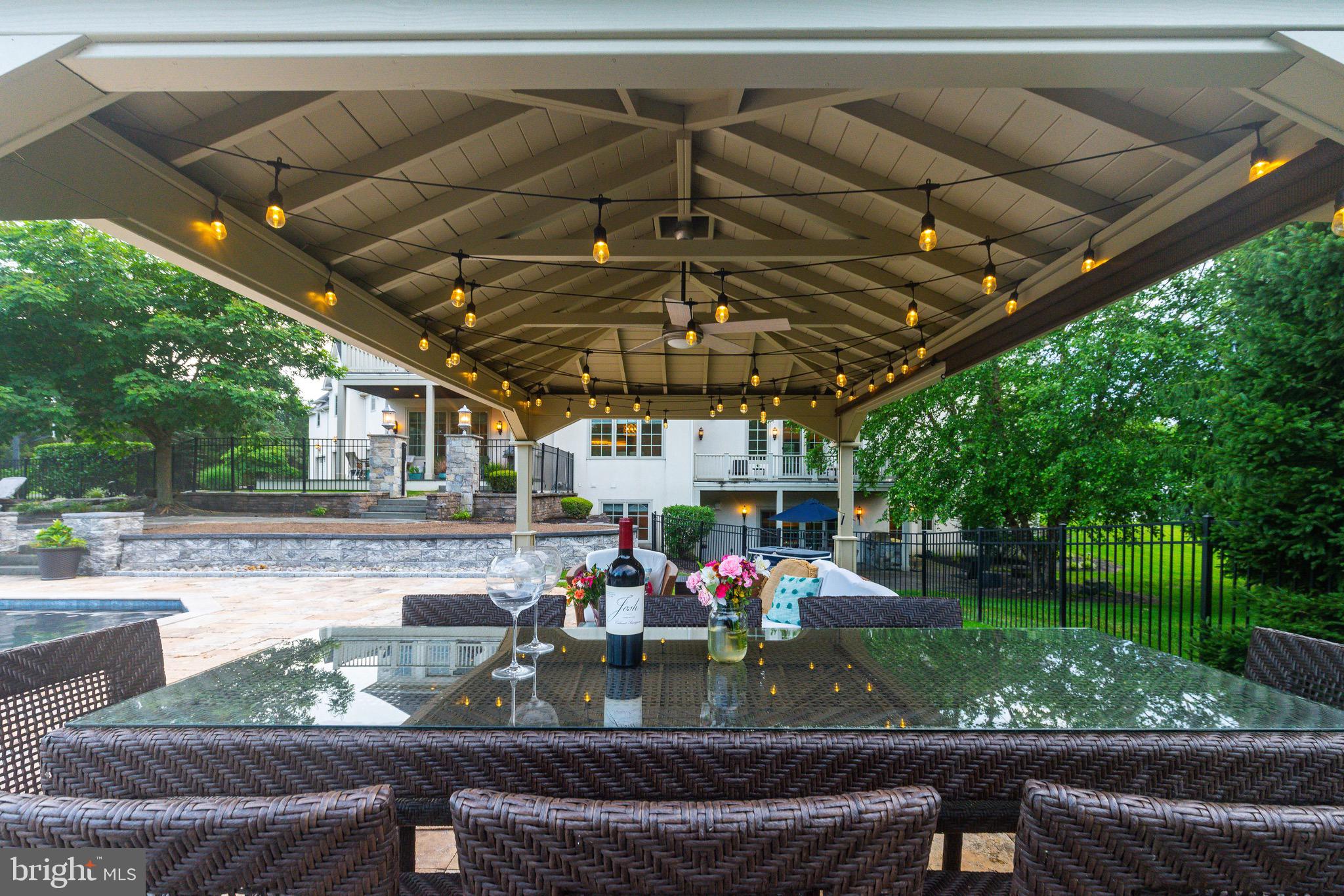 3 Stonebridge Crossing Road Newtown, PA 18940 - Photo 51 of 77 a view of a couches and dinning table and chairs in patio