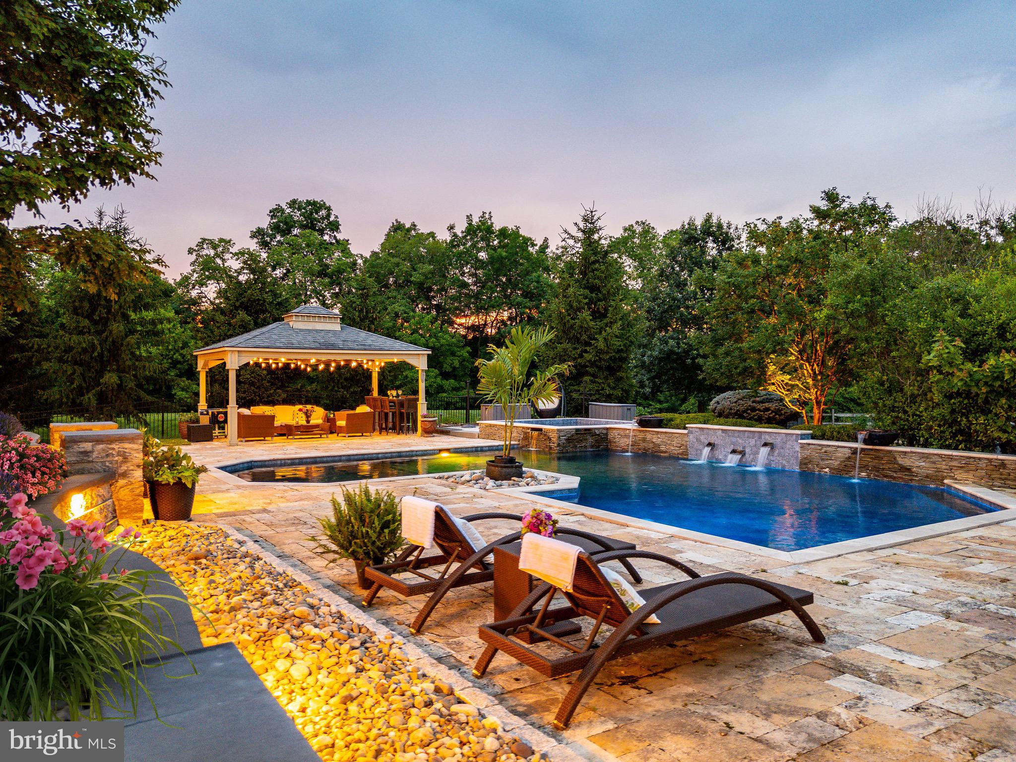 3 Stonebridge Crossing Road Newtown, PA 18940 - Photo 57 of 77 a view of a swimming pool with a patio