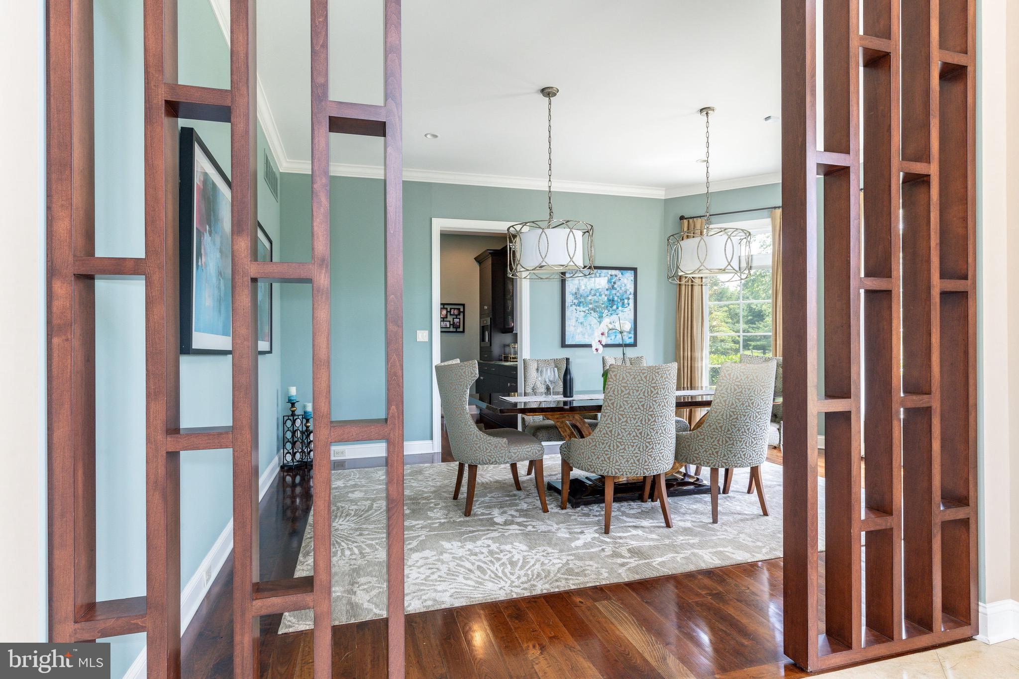 3 Stonebridge Crossing Road Newtown, PA 18940 - Photo 6 of 77 a view of a dining room with furniture window and wooden floor