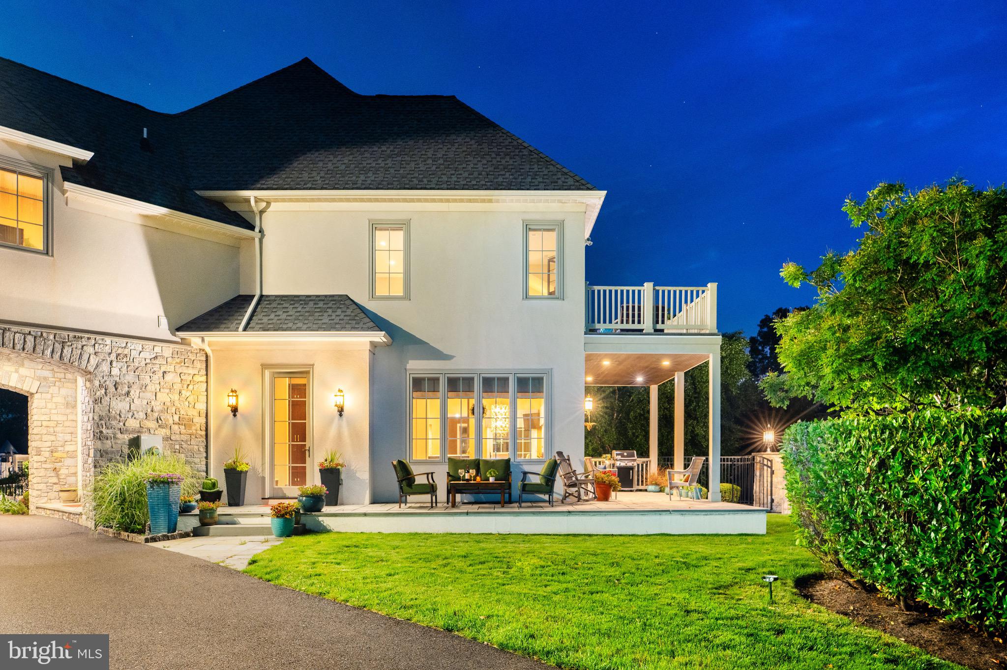 3 Stonebridge Crossing Road Newtown, PA 18940 - Photo 68 of 77 a front view of a house with a yard table and chairs
