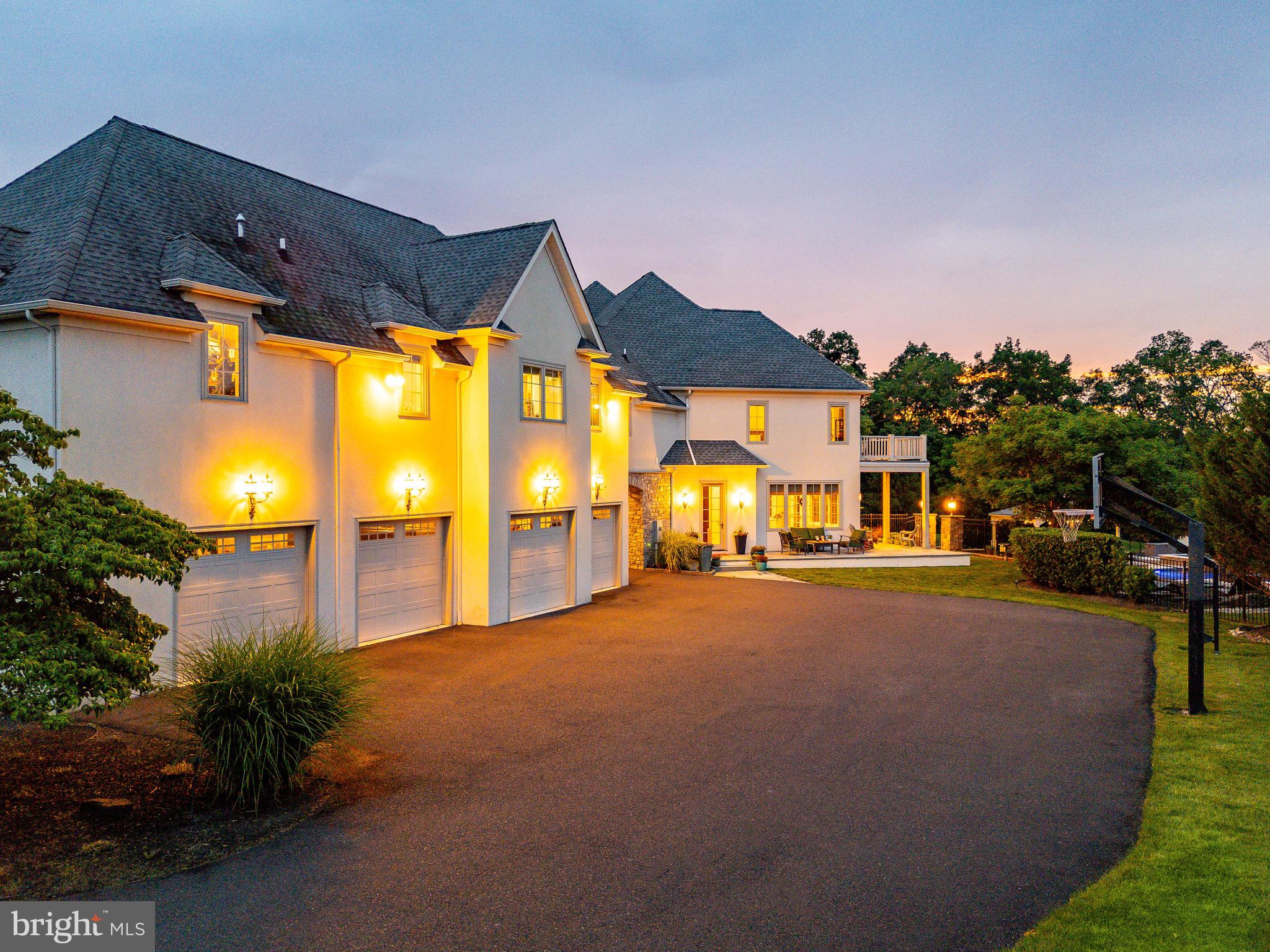 3 Stonebridge Crossing Road Newtown, PA 18940 - Photo 69 of 77 a view of a house with a yard and a garage