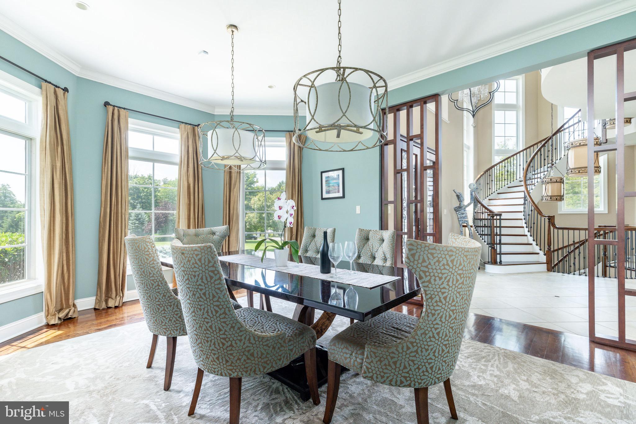 3 Stonebridge Crossing Road Newtown, PA 18940 - Photo 7 of 77 a view of a dining room with furniture window and wooden floor