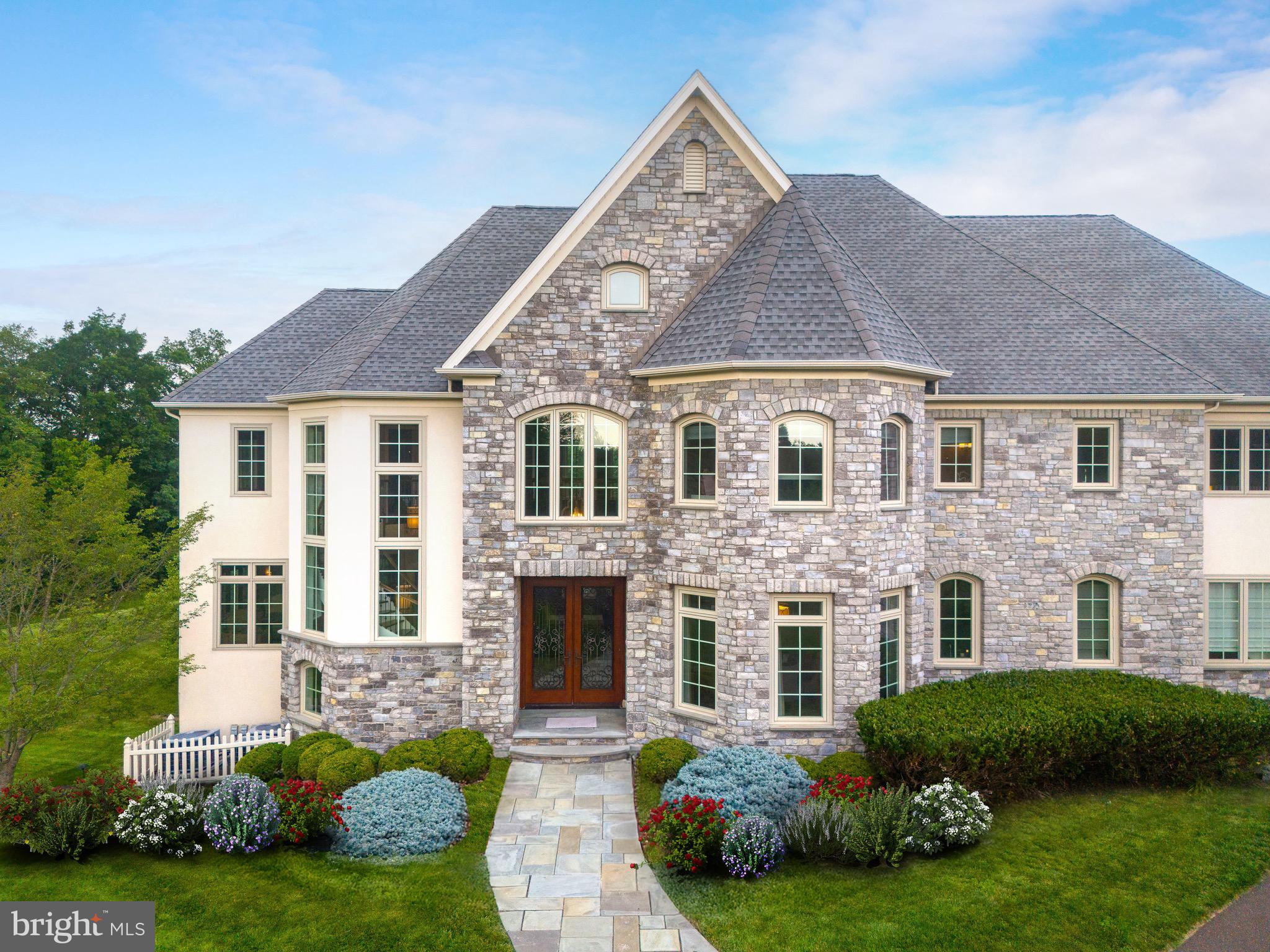 3 Stonebridge Crossing Road Newtown, PA 18940 - Photo 74 of 77 a front view of a house with a garden