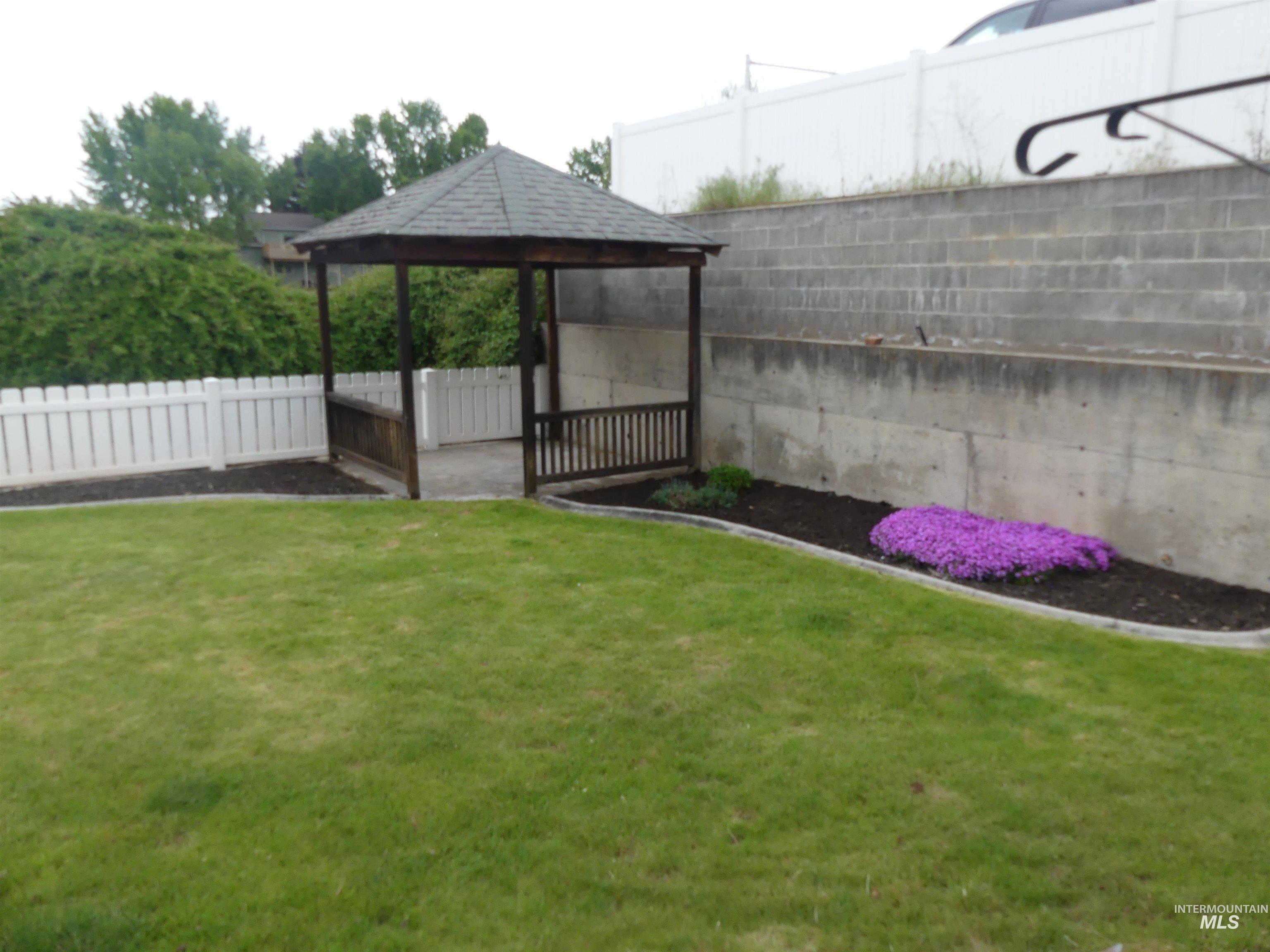 2625 16th Street Clarkston, WA 99403 - Photo 11 of 29 Fenced backyard featuring a gazebo and a patio
