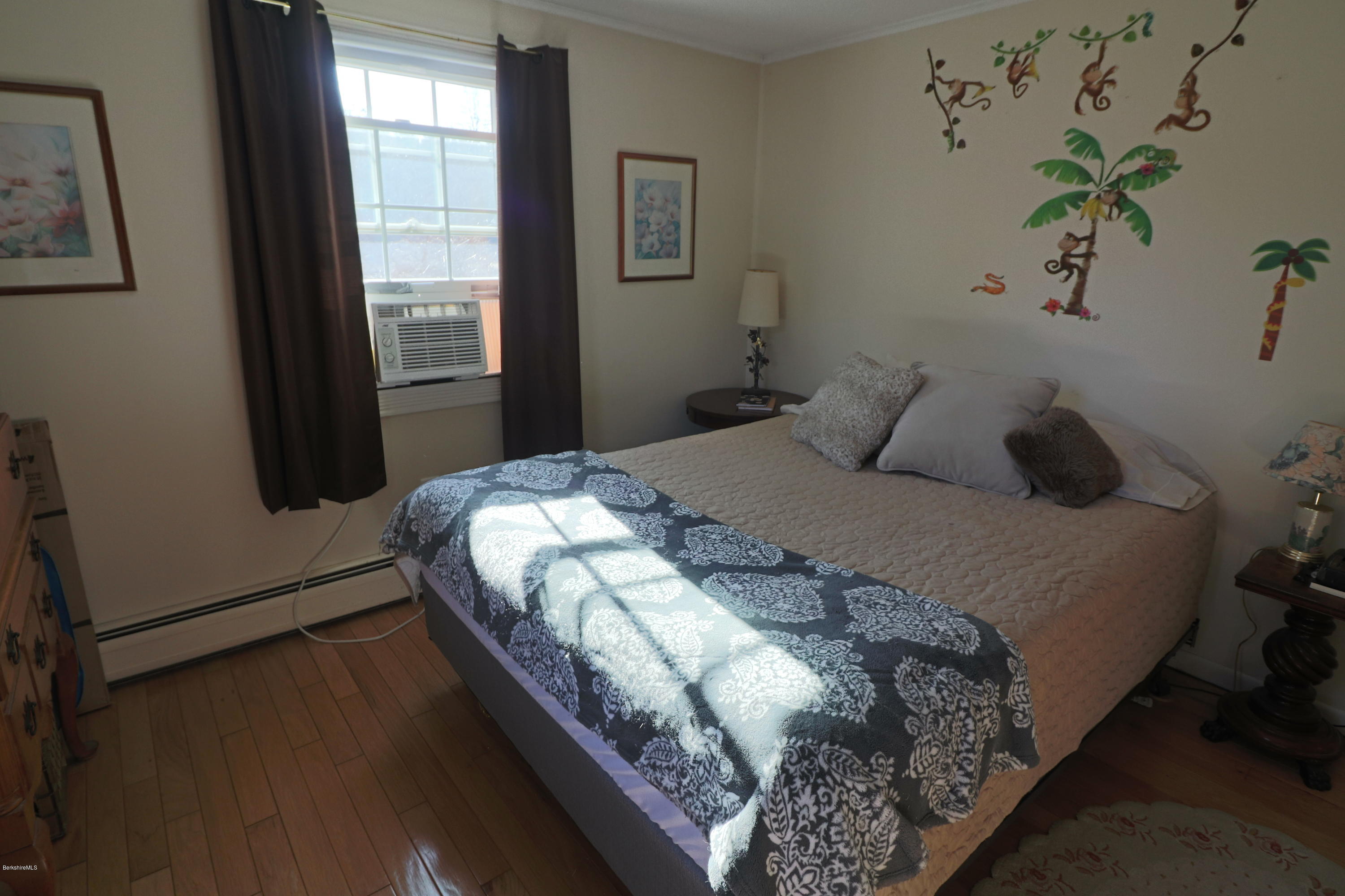 3 Mohawk Lake Road Stockbridge, MA 01229 - Photo 22 of 29 a bedroom with a bed and a window
