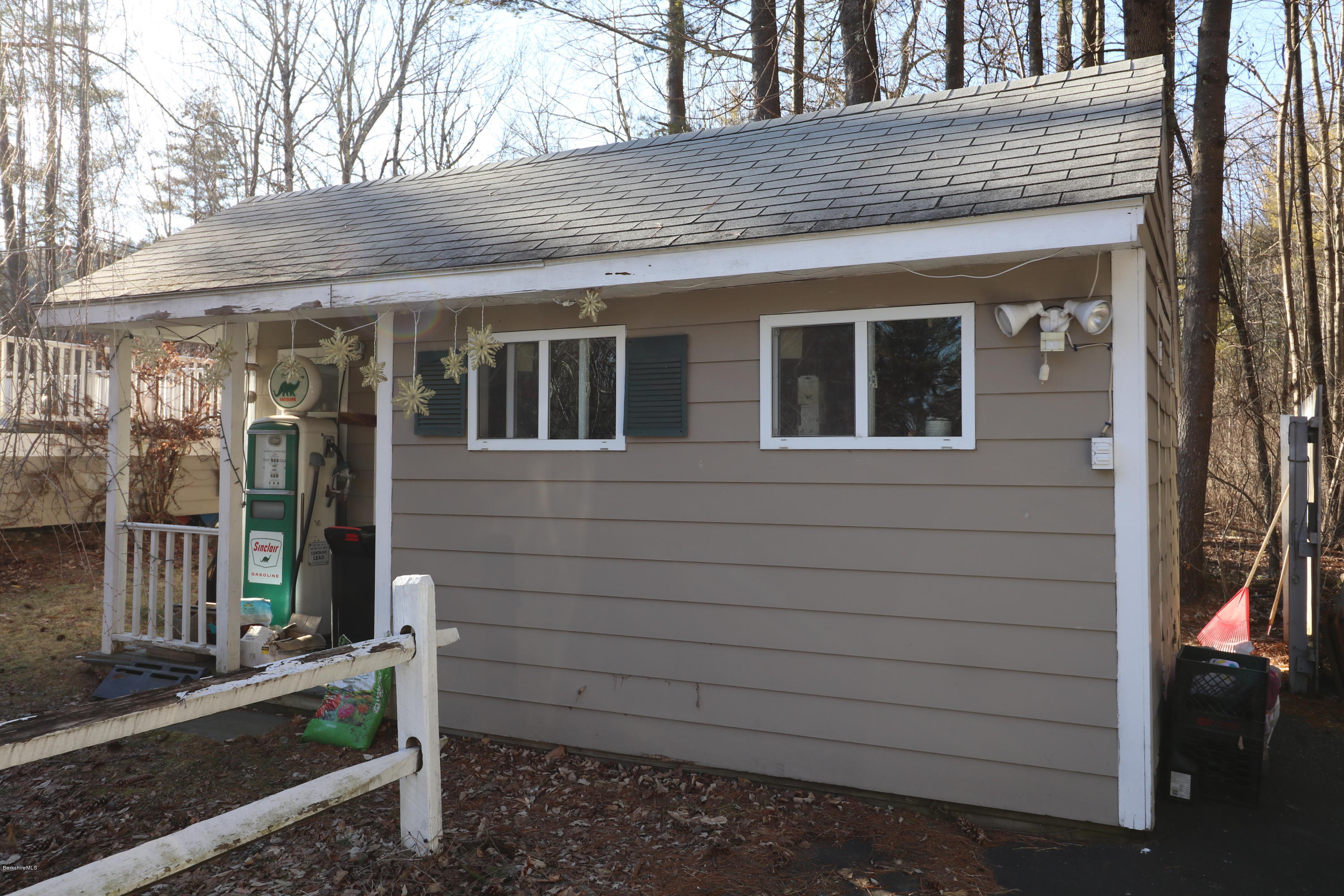 3 Mohawk Lake Road Stockbridge, MA 01229 - Photo 8 of 29 a front view of a house with a yard