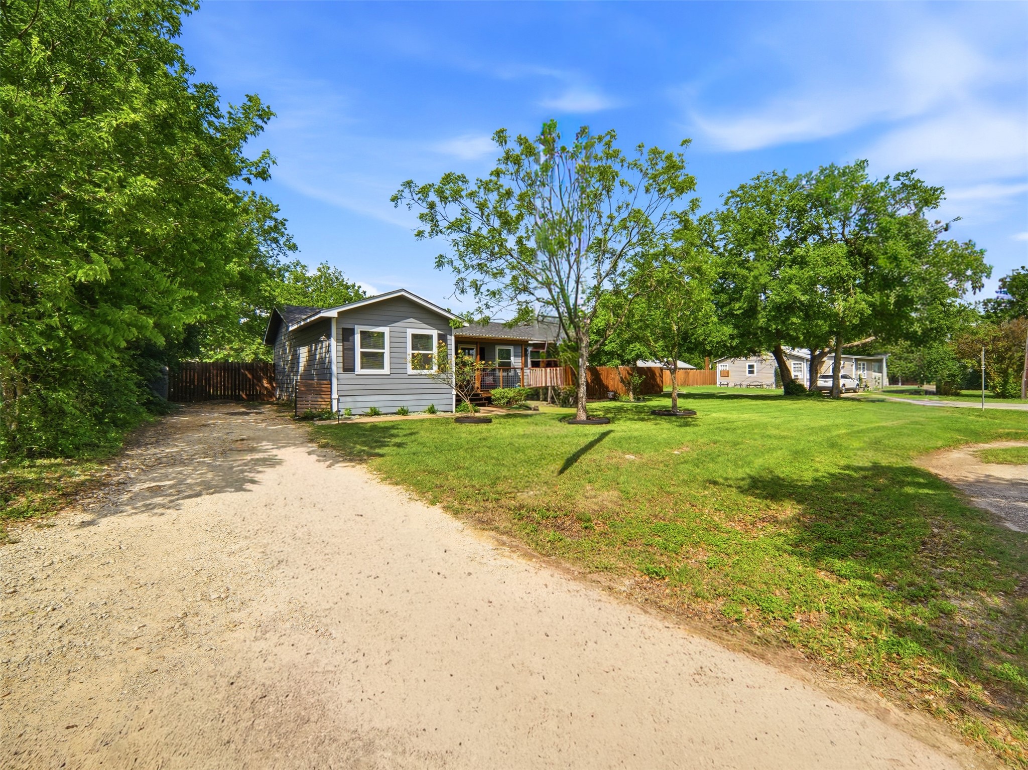 700 9th Street Blanco, TX 78606 - Photo 3 of 33 a front view of house with yard and green space