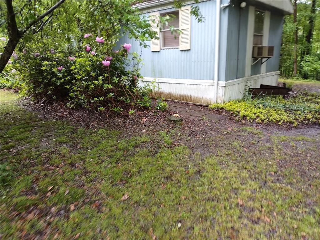 399 Long Road Utica, PA 16362 - Photo 1 of 17 a view of a backyard with plants