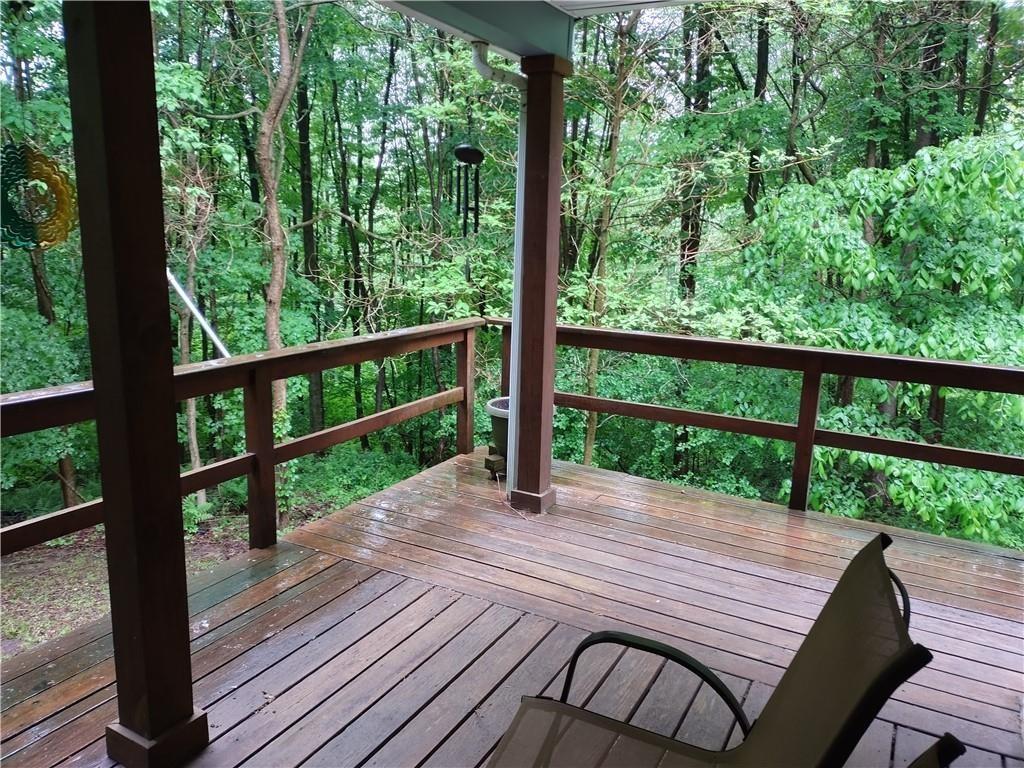 399 Long Road Utica, PA 16362 - Photo 9 of 17 a wooden floor with a balcony